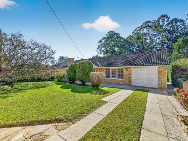 Immaculate full brick home in an idyllic North to rear setting