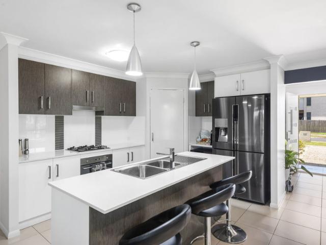 Immaculate Family Home. Backs onto Parkland!