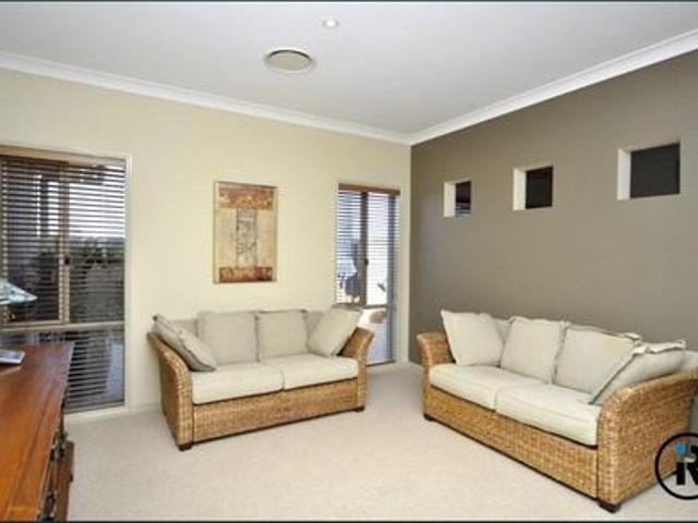 Immaculate Family Home in Exclusive Riverstone Crossing Estate