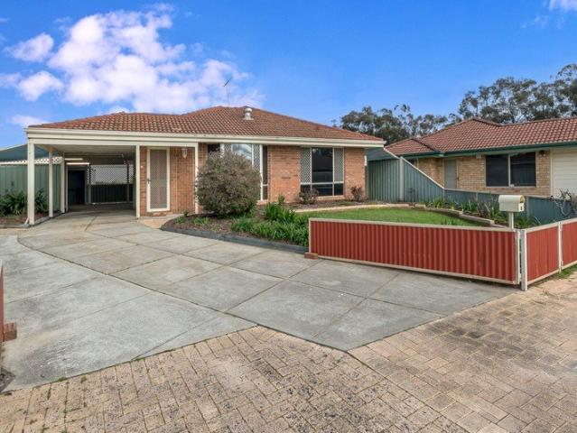 IMMACULATE FAMILY HOME WITH WORKSHOP & DUCTED AIR CON