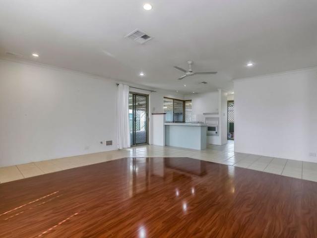 IMMACULATE FAMILY HOME WITH WORKSHOP & DUCTED AIR CON
