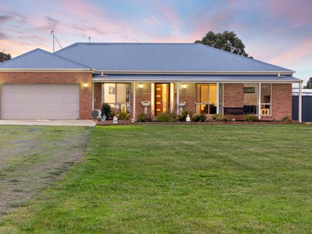 Immaculate Family Living on Half an Acre