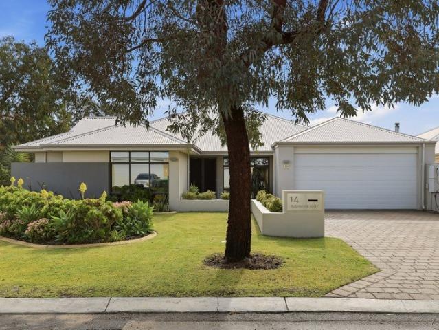 IMMACULATE FAMILY RESIDENCE WITH STUNNING LANDSCAPED GARDENS AND A CENTRAL CORNER SETTING
