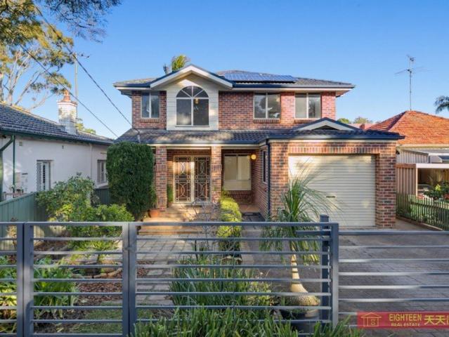 Immaculate Five Bedroom Brick Home in a Prime Location