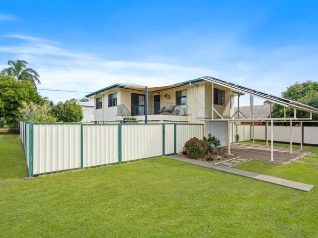 IMMACULATE FOUR BEDROOM HOME ON A CORNER BLOCK