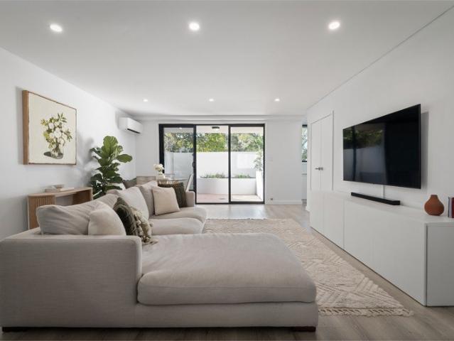 Immaculate ground floor living with sunlit courtyard appeal
