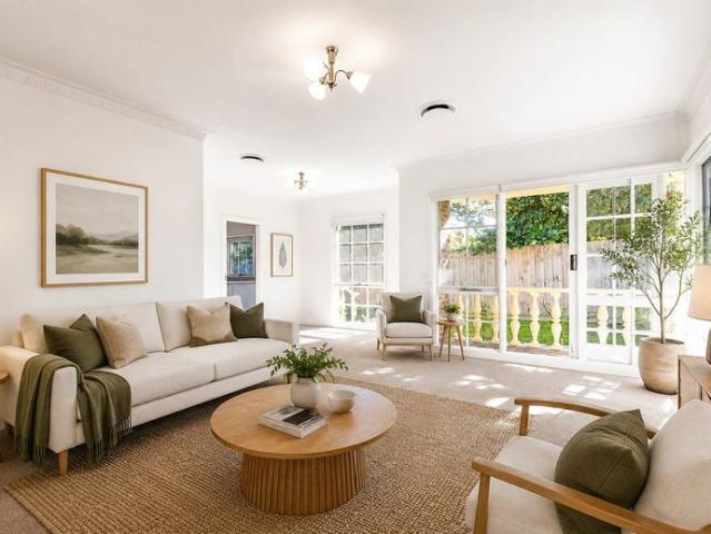 IMMACULATE, LIGHT FILLED THREE BEDROOM HOME