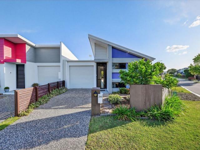Immaculate, Low Maintenance Living in a Highly Sought After Pocket