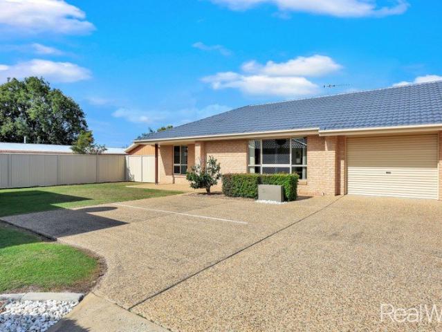 Immaculate, Low Maintenance Living in a Peaceful, Exceptionally Maintained Complex!