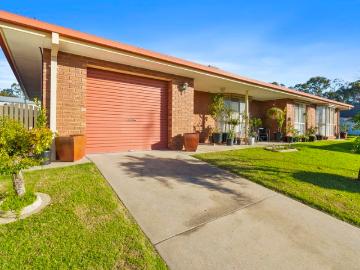 Immaculate Low Maintenance Living in a Prime Location