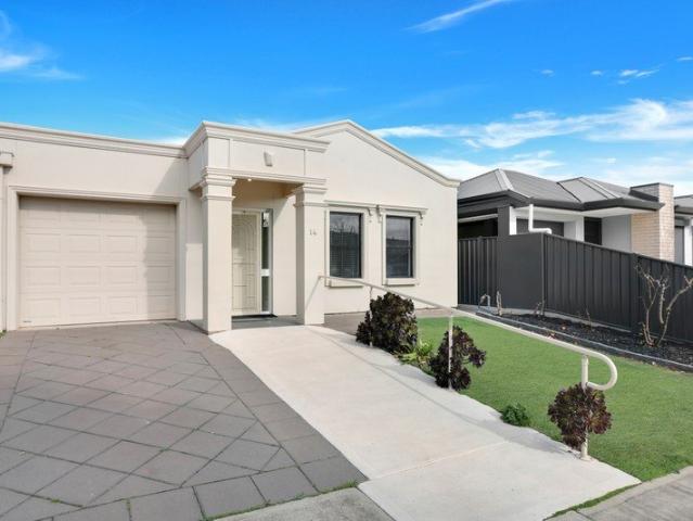 IMMACULATE LOW MAINTENANCE RESIDENCE IN A HIGHLY SOUGHT AFTER LOCATION