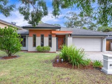 Immaculate Porter Davis Home in a Private Cul de Sac Setting