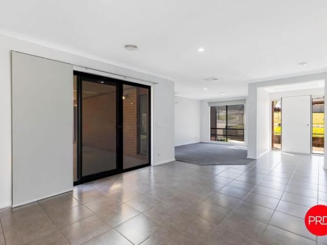 Immaculate presentation, space to entertain and room for the caravan