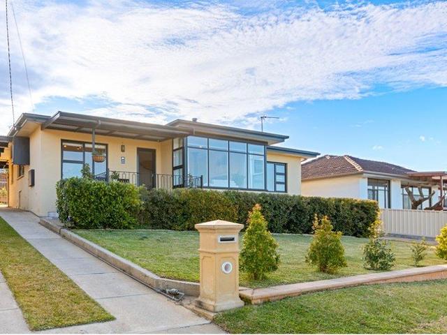 Immaculate renovation with sweeping ocean views.