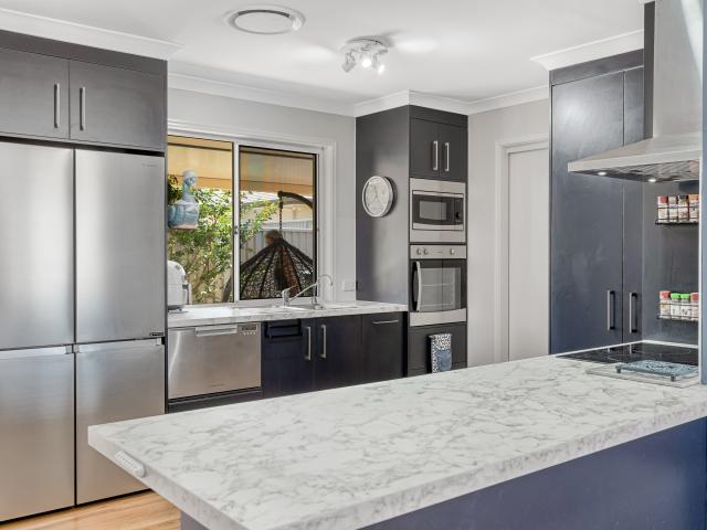 Immaculate Stand Alone Duplex with Modern Comfort and Low Maintenance Appeal!