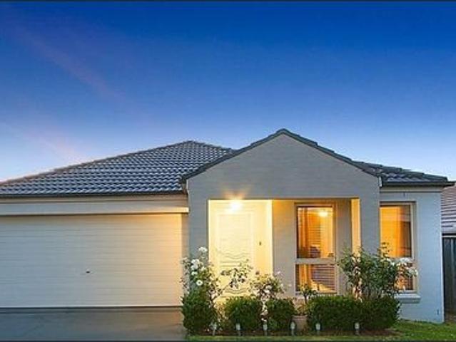 Immaculate Single Level Family Living in Prime Stanhope Gardens Location