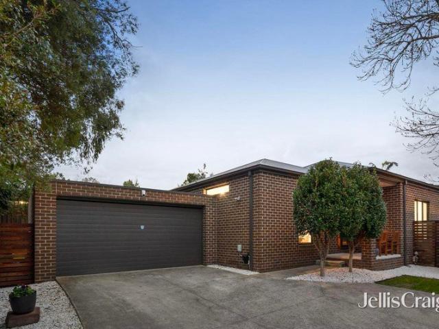 Immaculate single level residence with expansive alfresco deck