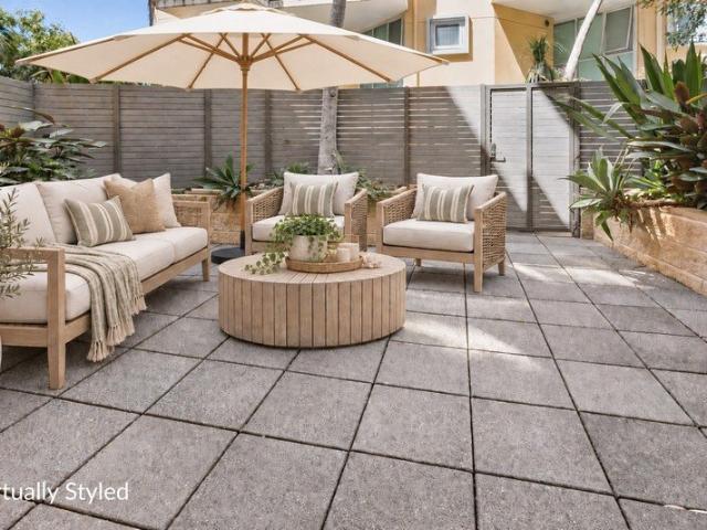 Immaculate split level courtyard apartment in a convenient Dee Why location