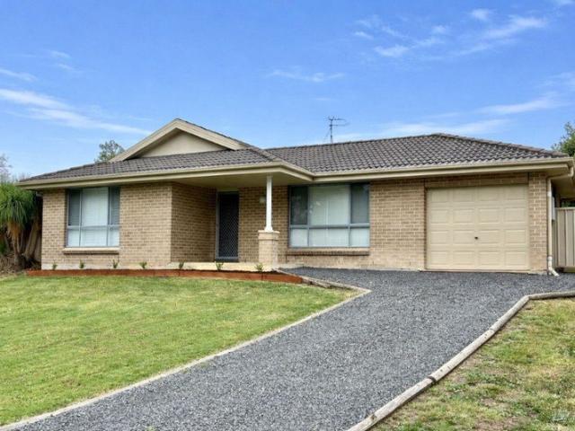 Immaculate Three Bedroom Brick Veneer Home with Exceptional Privacy and Modern Features
