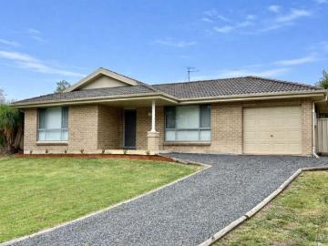 Immaculate Three Bedroom Brick Veneer Home with Exceptional Privacy and Modern Features