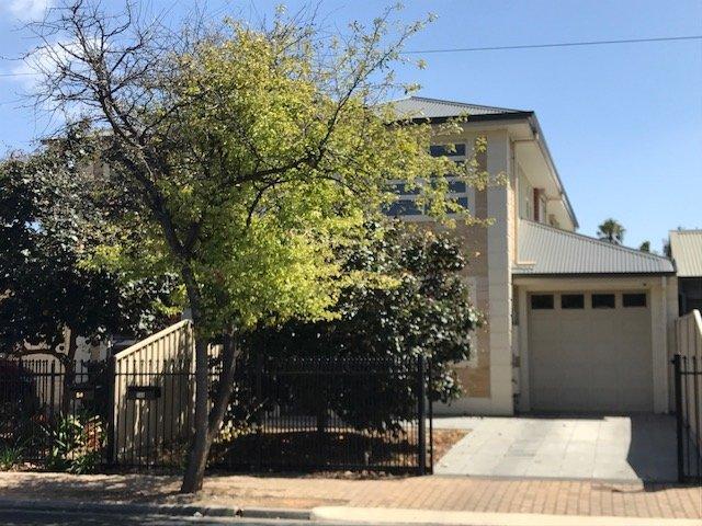 IMMACULATE THREE BEDROOM FULLY AIR CONDITIONED DOUBLE STOREY TOWNHOME RESIDENCE OFFERING THREE LIVING AREAS WITH ABSOLUTE LIFESTYLE
