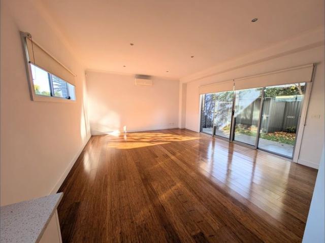 Immaculate three bedroom townhouse with own street frontage