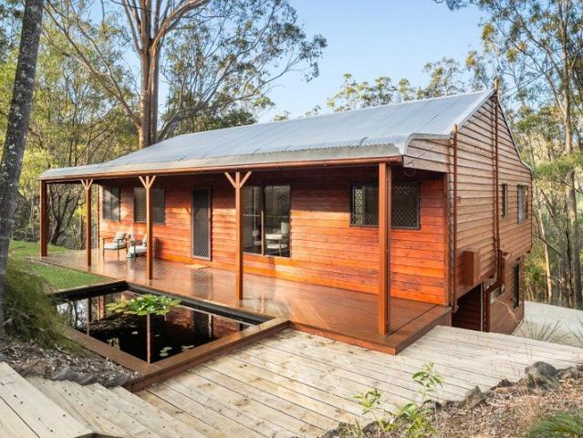 Immaculate Western Red Cedar Home with a Dual Living Option