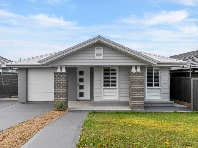 Immaculate 2022 Built Home with Exceptional Side Access