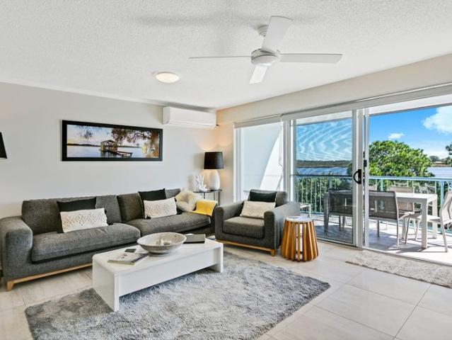 Immaculate 3 Bedroom Furnished Apartment with Private Rooftop River Views