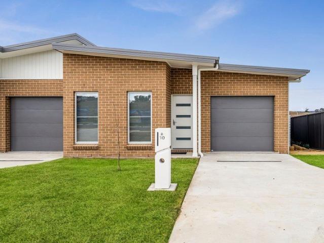 Immaculate 4 Bedroom Torrens Title Duplex in New Estate