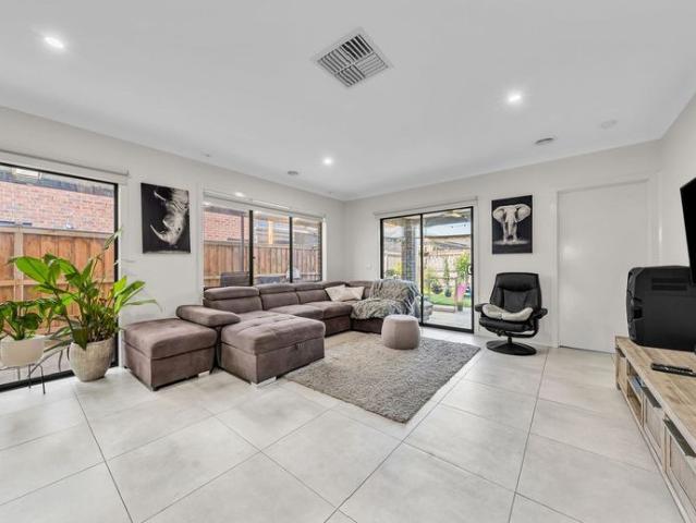 Immaculate 4 Bedroom Home in a Thriving Family Friendly Community!
