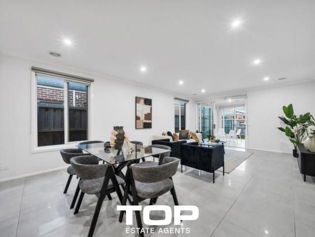 Immaculate 4 Bedroom Home in a Thriving Family Friendly Community!