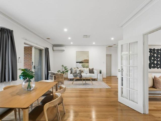 IMMACULATELY MAINTAINED, EASY CARE LIVING