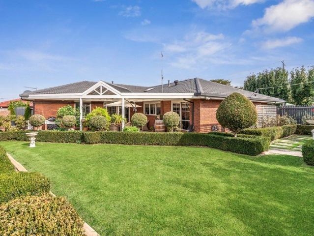 Immaculately Maintained Family Home with Beautiful Gardens