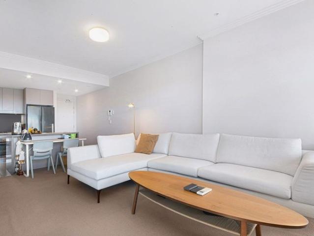 Immaculately North Aspect one bedroom apartment with Enclosable Wintergarden Sunroom and Views