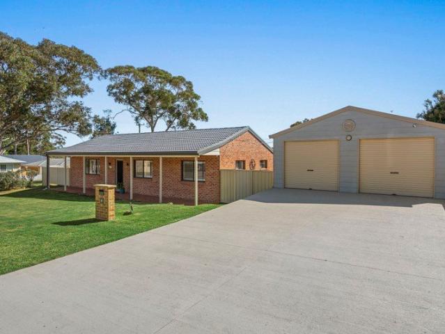 Immaculately Presented Family Home with Exceptional Garaging