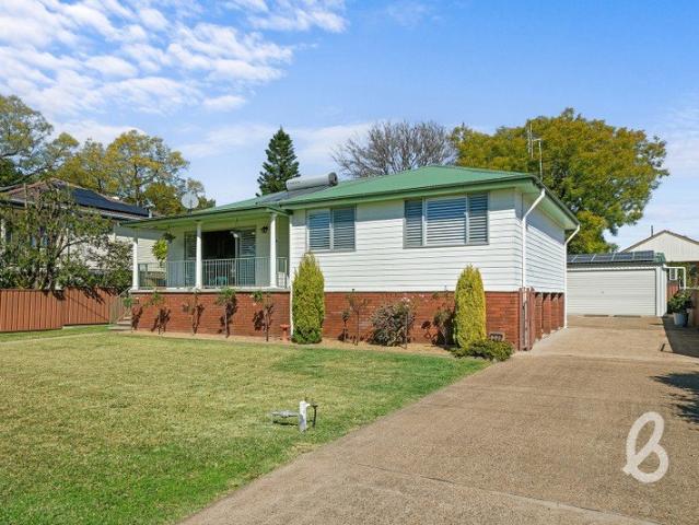Immaculately Presented Family Home with Outstanding Shed
