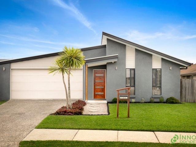 Immaculately Presented Family Home With Two Living Areas, A Beautifully Appointed Kitchen & A Fabulous Covered Deck!