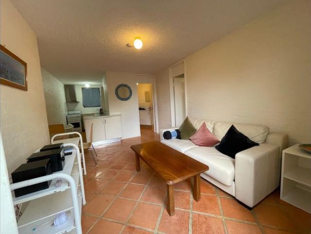 Immaculately presented renovated fully furnished ground floor garden apartment close to everything door
