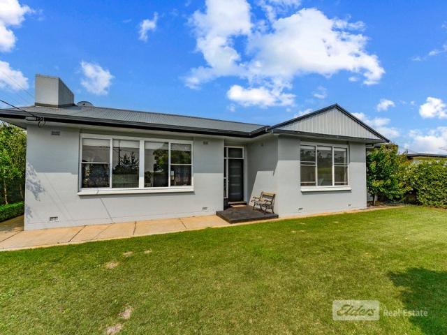 Immaculately Presented Stone Family Home in a Sought After North Location
