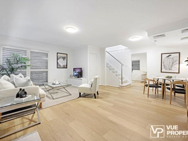 Immaculate free standing townhouse with wrap around courtyard and rare 286sqm on title