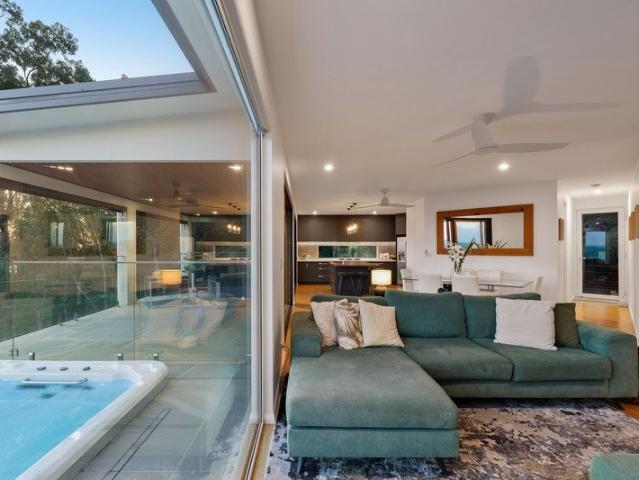 Immerse yourself in luxury and privacy with this 4 level split masterpiece, complete with self contained Studio apartment and commanding views