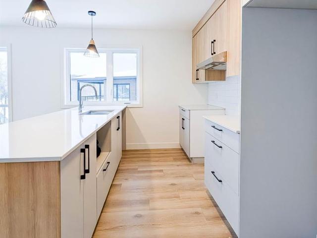 Immeuble 16 Rue Allen Est, Waterloo 4 1/2+Den 1000$ À L'EMMÉNAGEMENT!