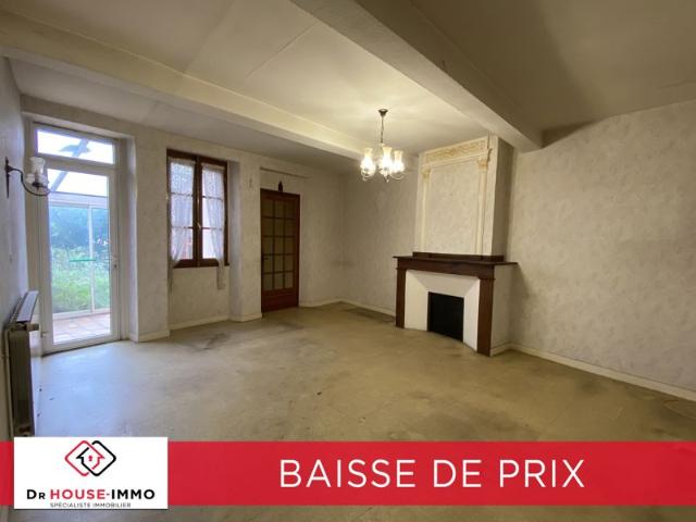 Immeuble / Maison avec 2 garages + un jardin