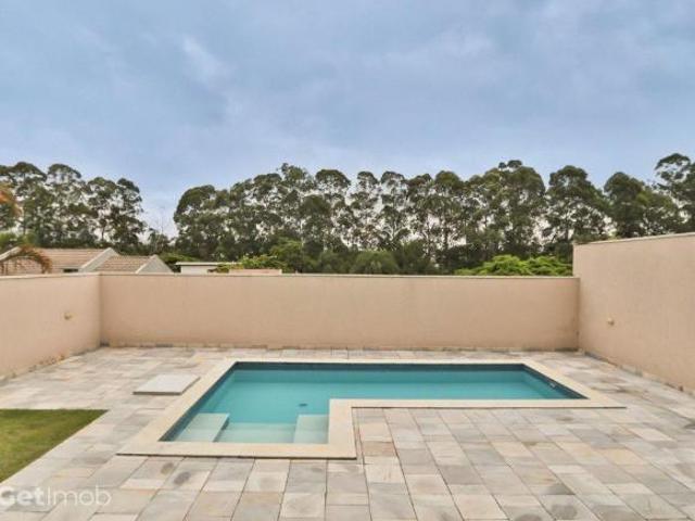 Casa com 4 dormitórios à venda, 300 m² por R$ 3.100.000,00