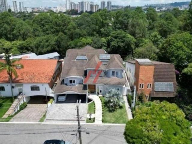 Imóvel de Luxo em Alphaville: Casa em Condomínio com 4 quartos, 4 suítes e 450m² de área Santana d