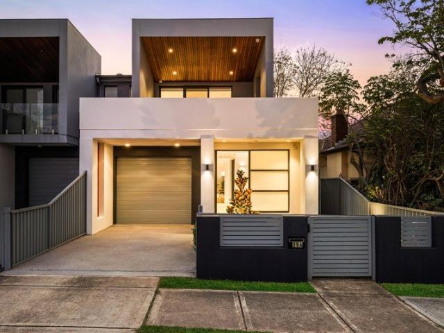 Impeccable modern family home with premium construction and all weather entertaining