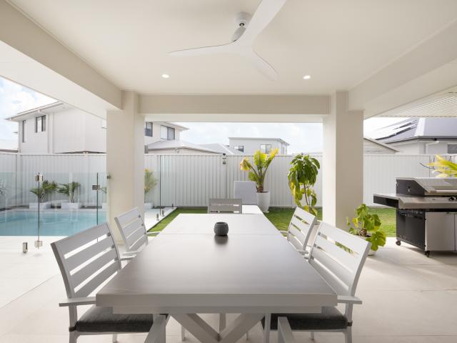 Impeccable Family Entertainer with Pool in Premium Pelican Waters Location