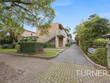 Impeccable Stylish Living in a Leafy Blue Chip Location and Unique Park like Common Area!