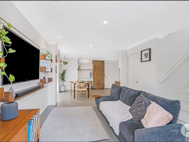 Impeccable two bedroom townhome in pet friendly complex